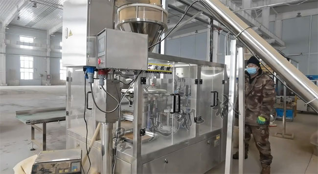 星火农化生物改良剂粉剂自动包装装箱生产线案例